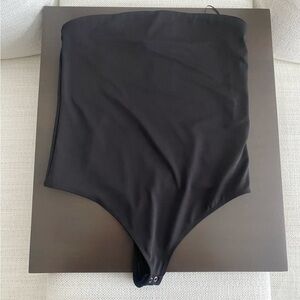 Body contour compression bodysuit